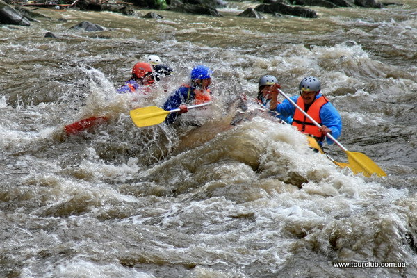 rafting in the Carpathians. In a rapid